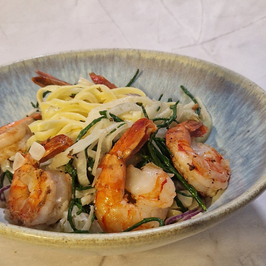 Arno’s pasta scampi met look, witte wijn en romige saus van Arno’s to go in Beveren