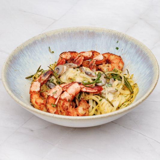 Pasta scampi met romige witte wijnsaus met look bij Arno's to go in Beveren