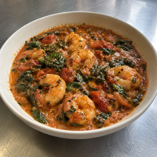 Scampi op z’n Toscaans met spinazie en pittige tomatensaus van Arno’s to go in Beveren